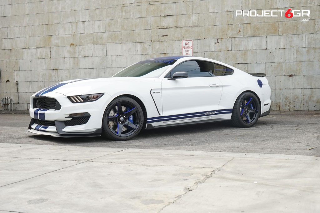 best white mustang with black rims